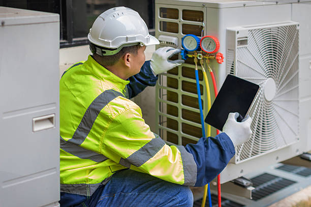 Professional Heat Pump Repair technician working in Attica, MI